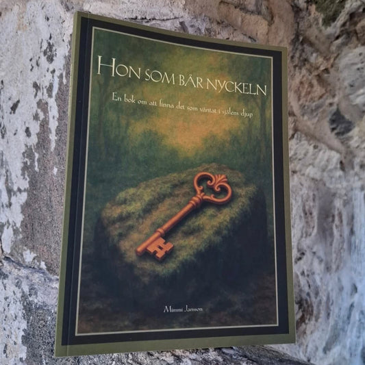 Hon som bär nyckeln